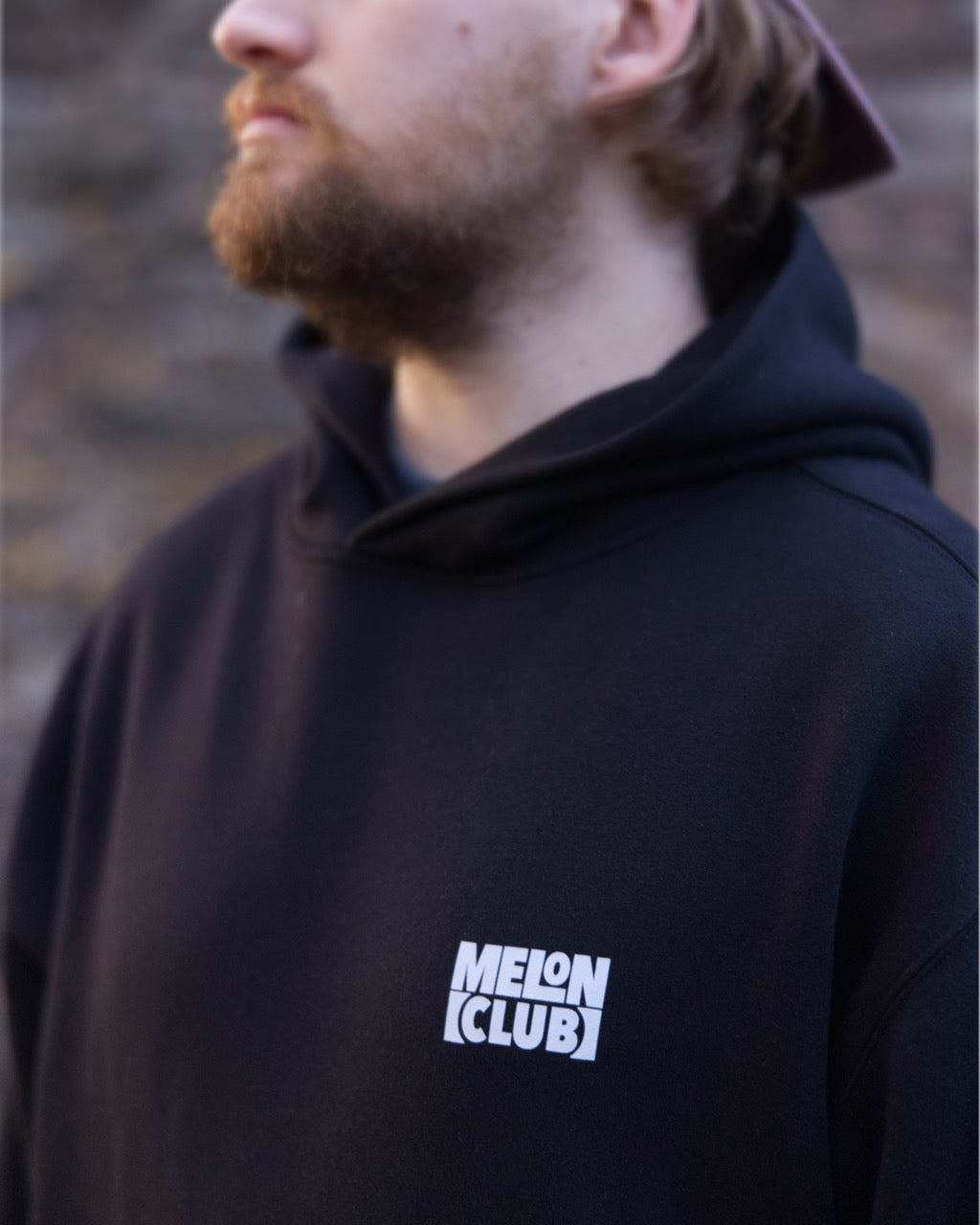 MelonClub // Heavy Black Hoodie // 320gsm // Front Close Up Lifestyle // MelonClub